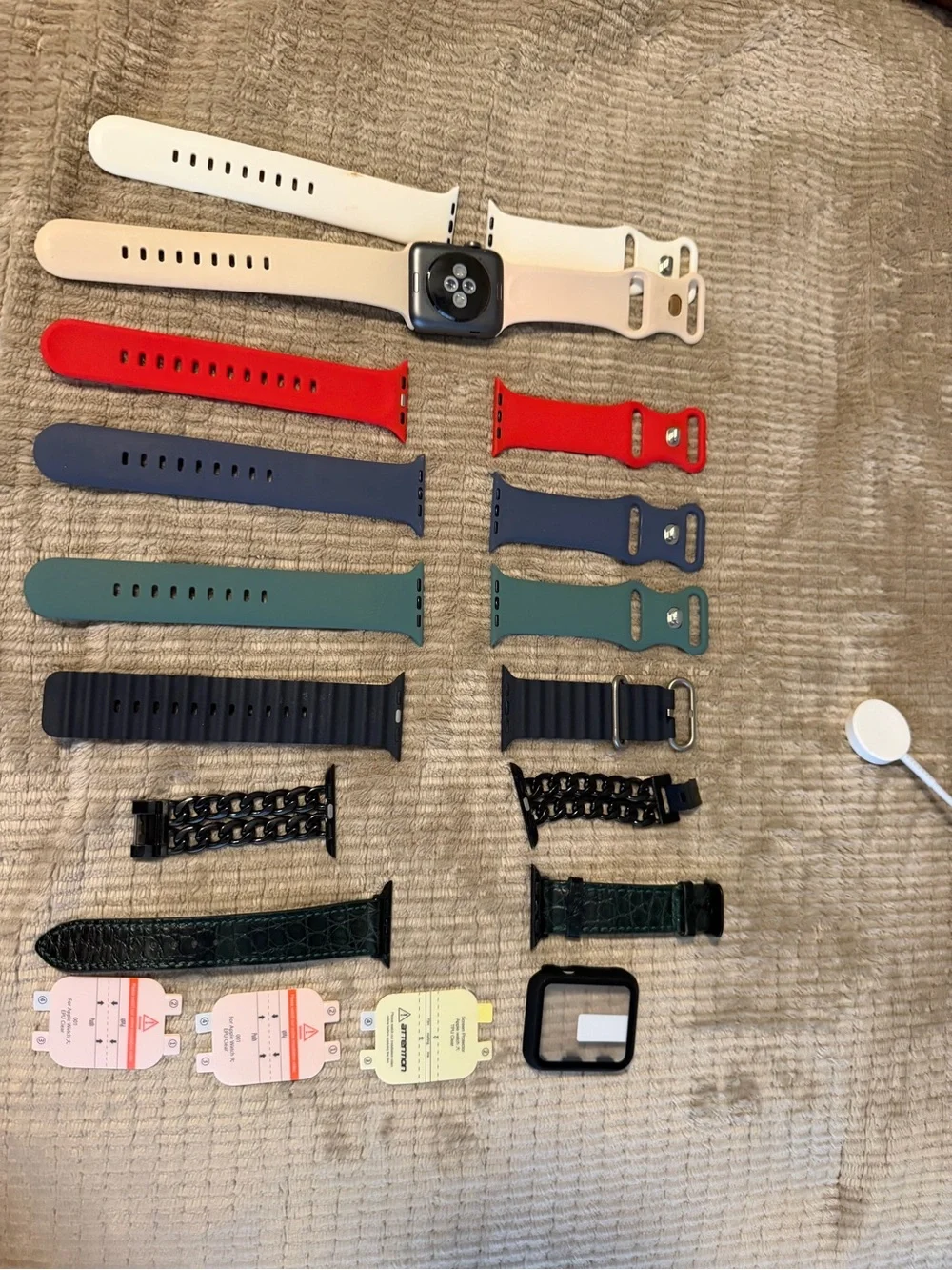 Apple Smartwatch with White, Red, and Blue Sport Bands
